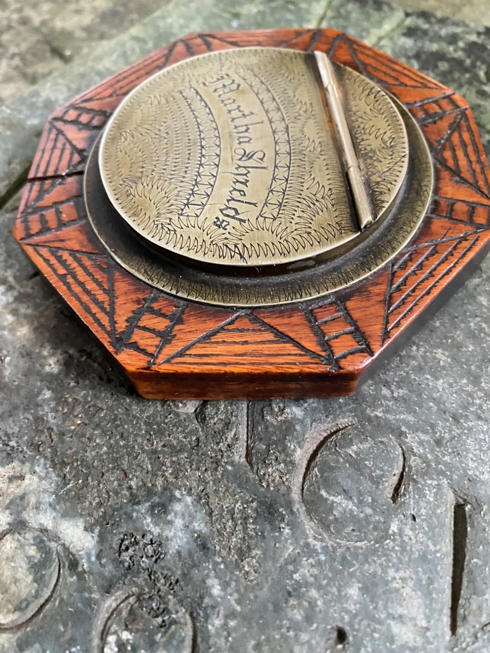 An early nineteenth-century octagonal carved wooden treen snuff box featuring an engraved brass hinged lid inscribed with the name Martha Shields. View IV