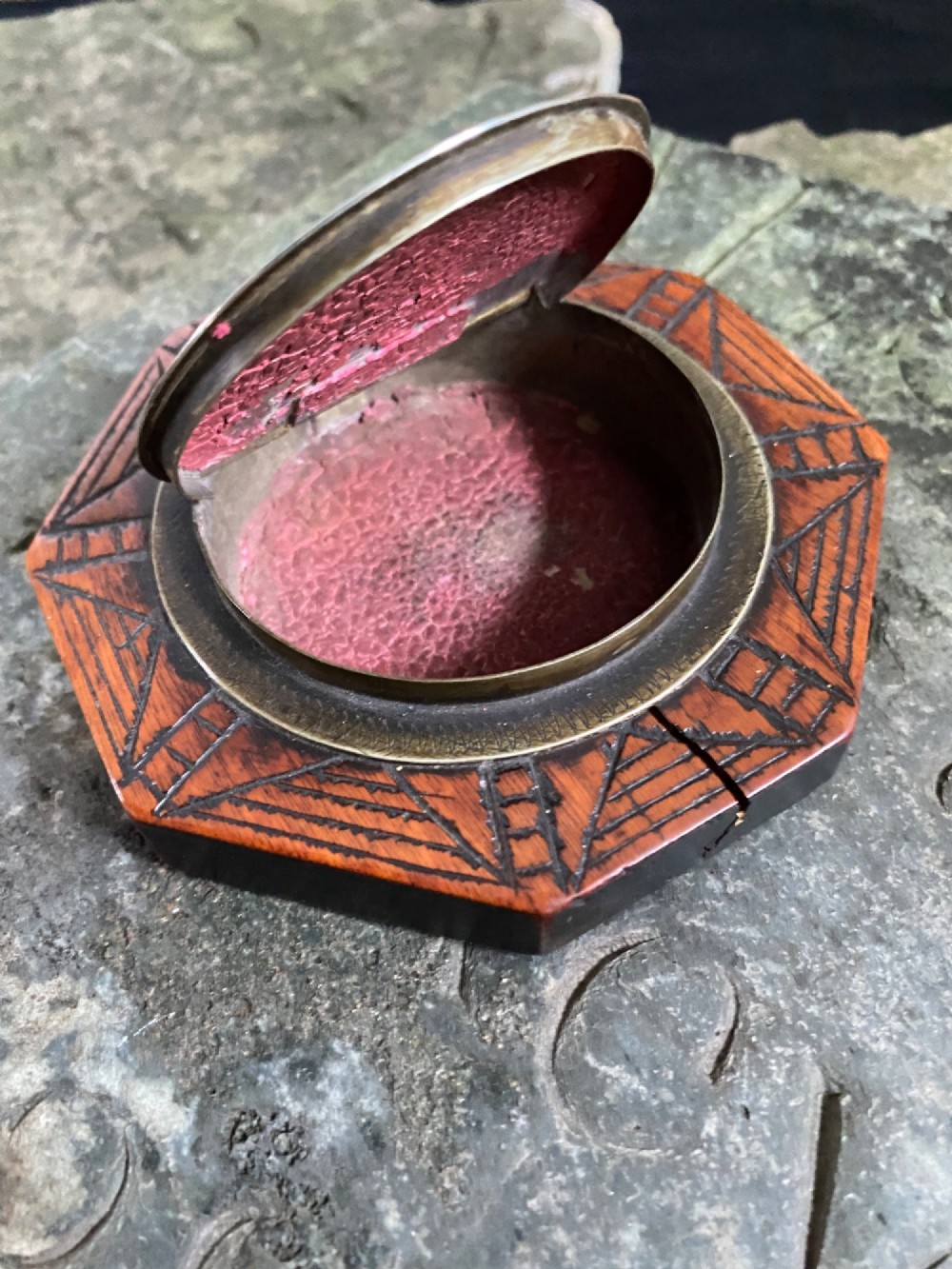 An early nineteenth-century octagonal carved wooden treen snuff box featuring an engraved brass hinged lid inscribed with the name Martha Shields. View VI