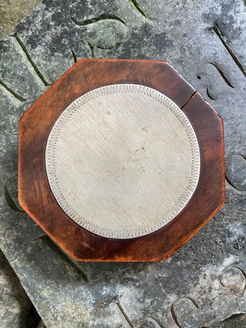 An early nineteenth-century octagonal carved wooden treen snuff box featuring an engraved brass hinged lid inscribed with the name Martha Shields. View VIII