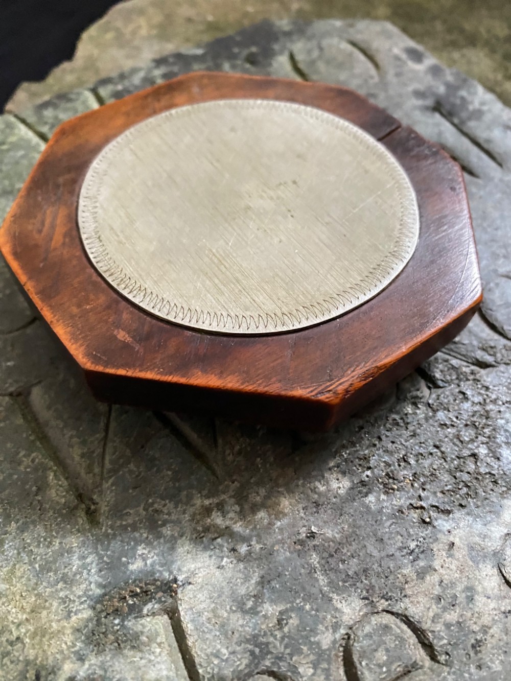 An early nineteenth-century octagonal carved wooden treen snuff box featuring an engraved brass hinged lid inscribed with the name Martha Shields. View IX
