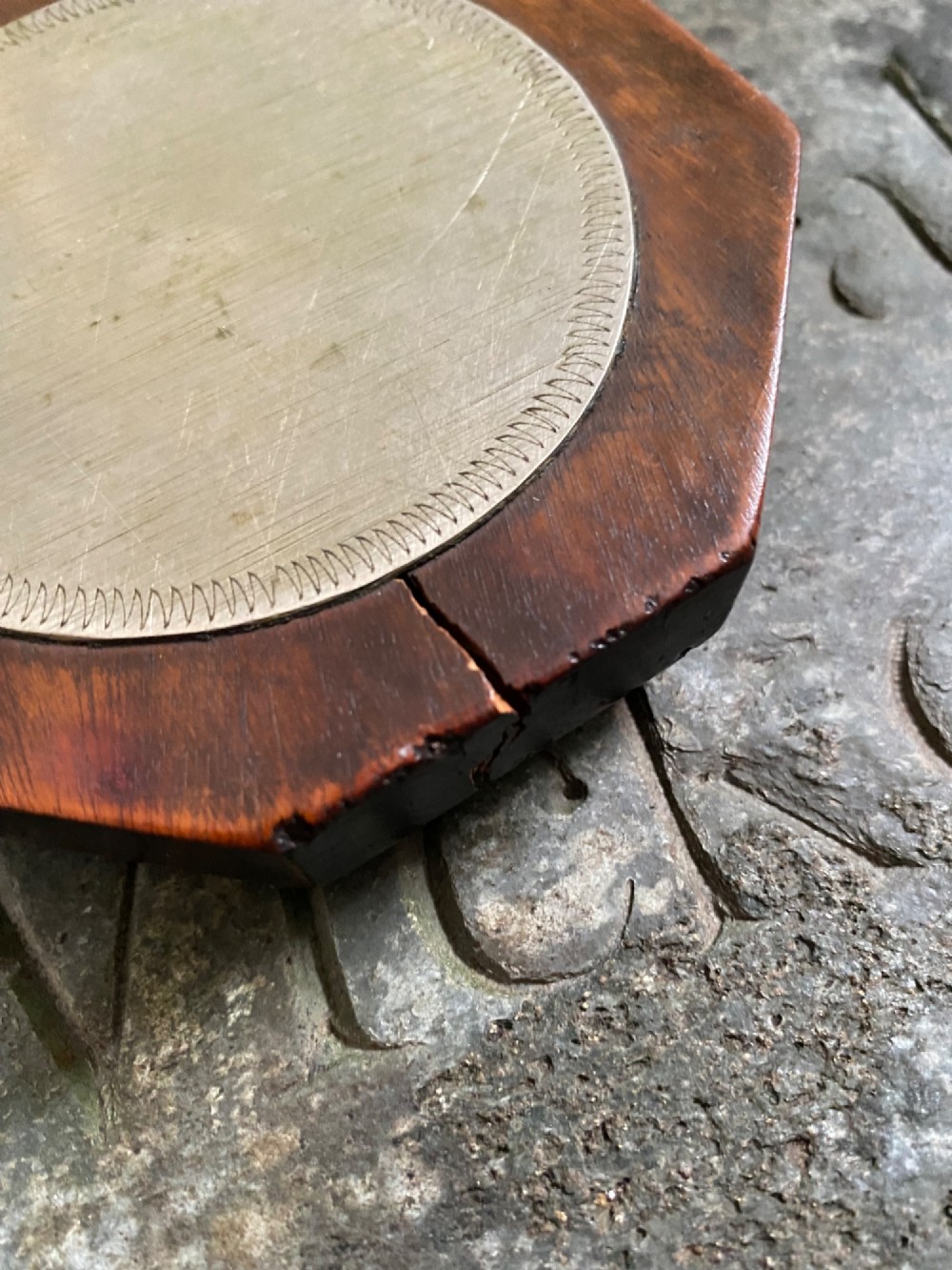An early nineteenth-century octagonal carved wooden treen snuff box featuring an engraved brass hinged lid inscribed with the name Martha Shields. View X