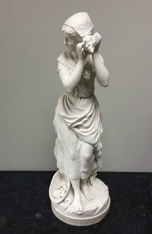 Sculpture of a Girl with Shells
