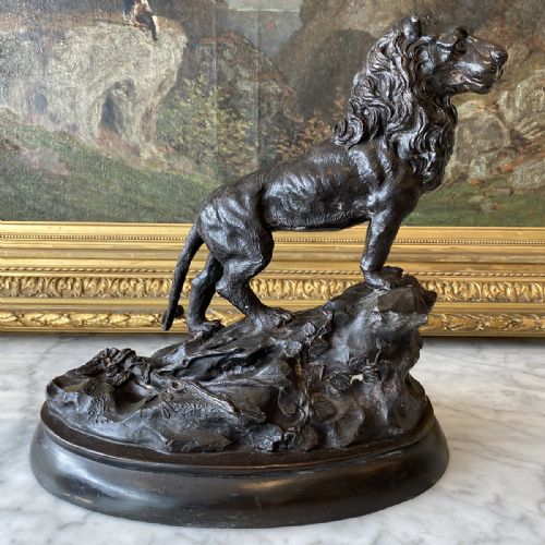 Bronze Lion on a Rock