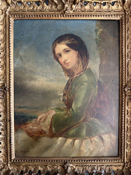 fig 2. An antique oil portrait depicting a young woman in a green dress and brown head covering seated against a landscape backdrop.