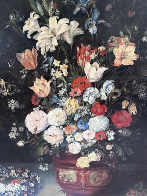 fig 3. An antique oil painting depicting a dense arrangement of colourful flowers inside a terracotta-toned urn against a dark background.