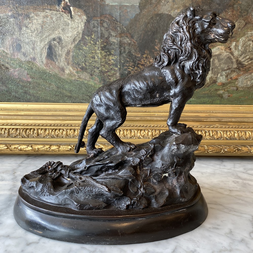 Bronze Lion on a Rock