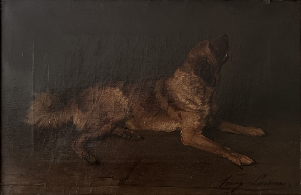An antique oil painting depicting a brown and black canine lying on a surface against a dark background with an artist signature in the lower right corner.