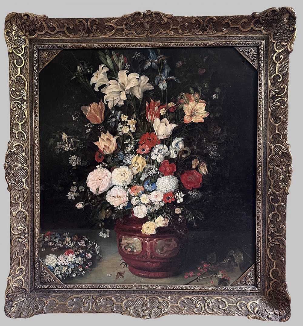 An antique oil painting depicting a dense arrangement of colourful flowers inside a terracotta-toned urn against a dark background. View II