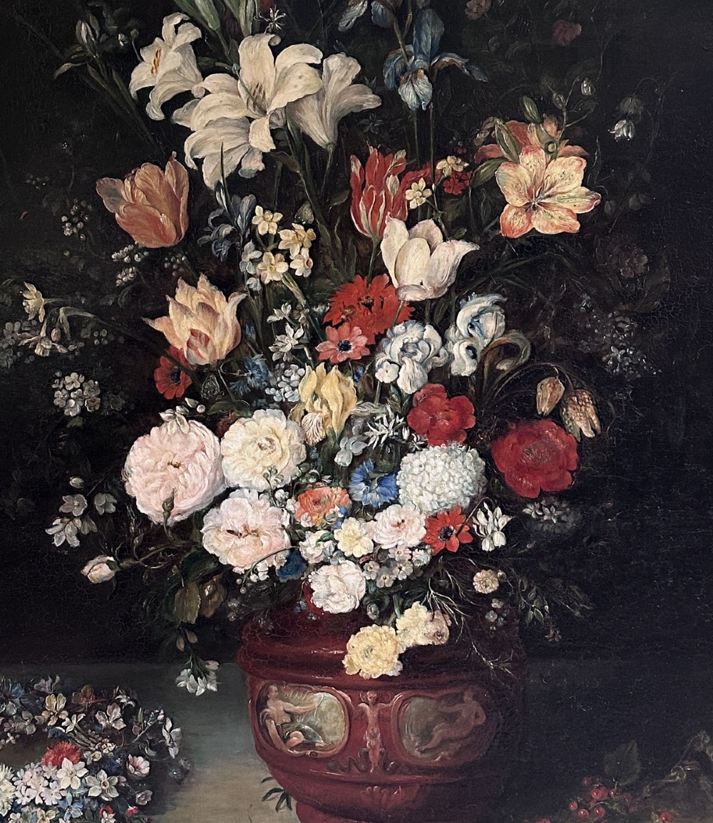 An antique oil painting depicting a dense arrangement of colourful flowers inside a terracotta-toned urn against a dark background. View III
