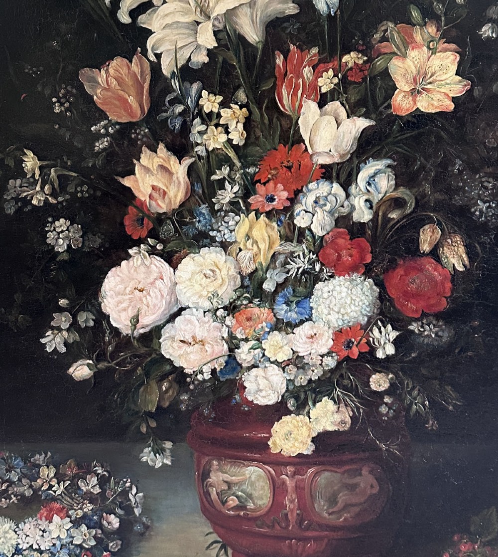 An antique oil painting depicting a dense arrangement of colourful flowers inside a terracotta-toned urn against a dark background. View VII