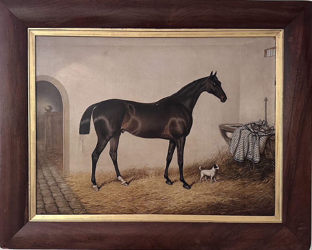 An antique oil painting depicting a dark bay horse standing inside a stable alongside a small terrier dog. View III