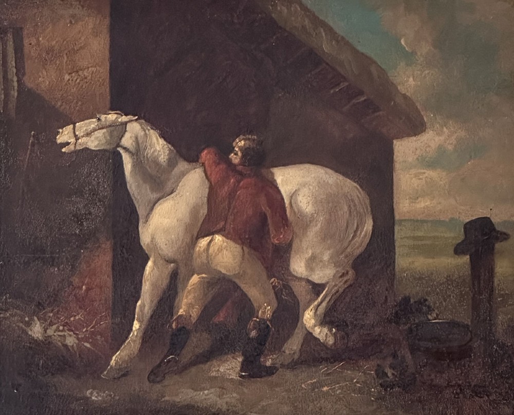 An antique oil painting depicting a groom in a red jacket attending to a white horse beside a rustic barn exterior.