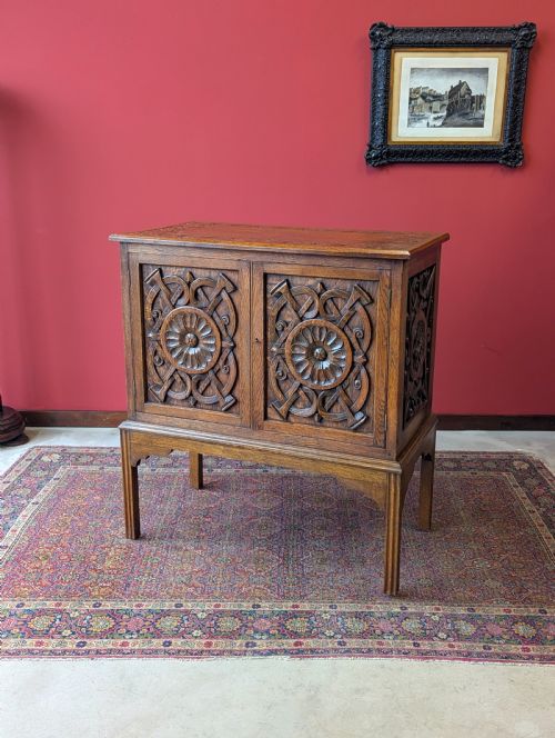 Antique Early 20th Century Carved Oak Raised Cupboard
