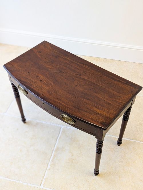ANTIQUE GEORGIAN MAHOGANY BOWFRONT WRITING TABLE C1810 - ADDITIONAL PHOTO 1