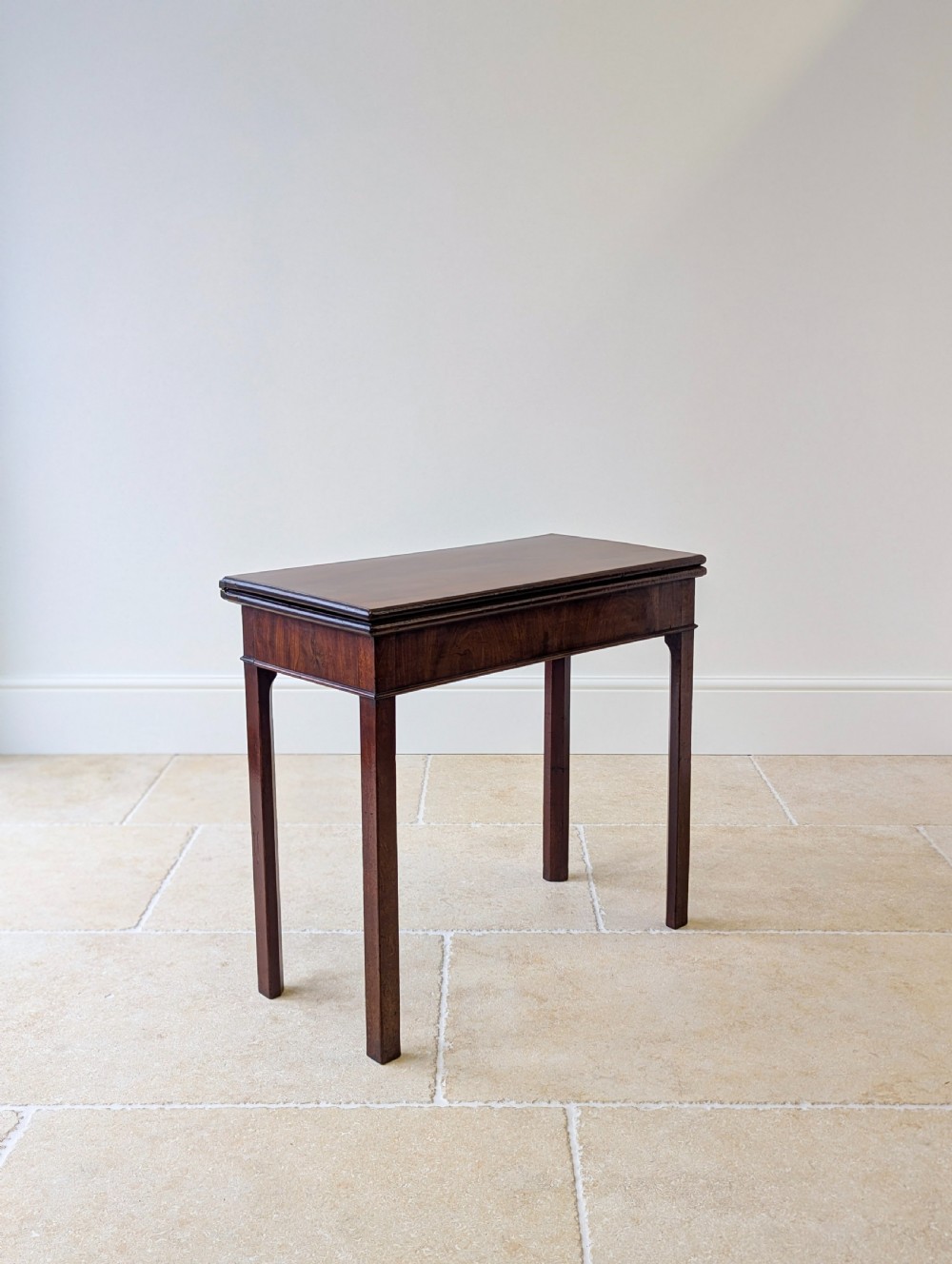 A Regency mahogany flip-top card table with square legs and a flame mahogany frieze. View VII