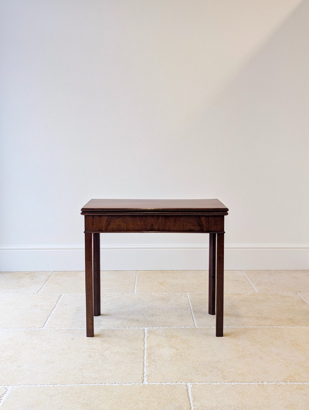 A Regency mahogany flip-top card table with square legs and a flame mahogany frieze. View XI