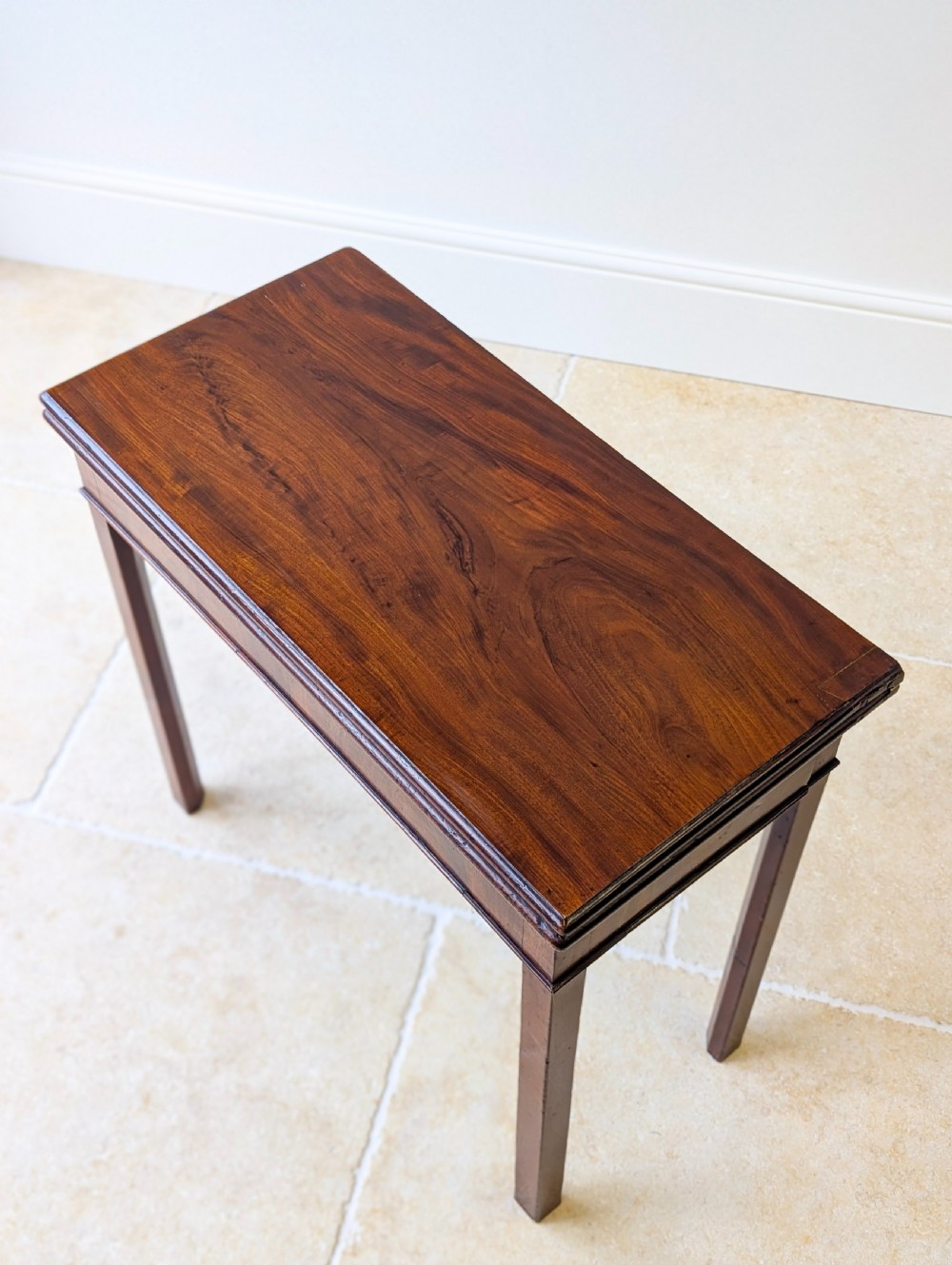A Regency mahogany flip-top card table with square legs and a flame mahogany frieze. View XIII