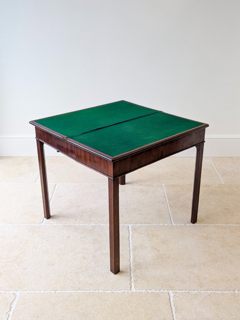 A Regency mahogany flip-top card table with square legs and a flame mahogany frieze. View XVII