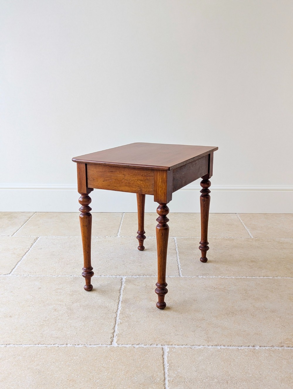 A late Victorian mahogany side table featuring a rectangular top, single drawer with two turned wooden knobs, and four turned legs. View XIII