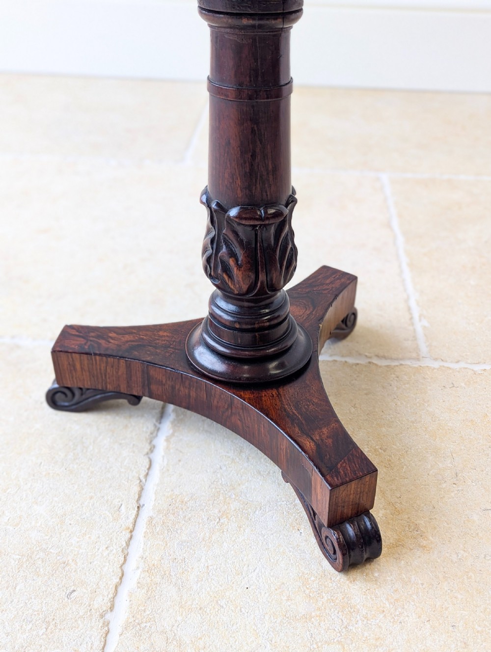 A William IV rosewood adjustable piano stool featuring a circular floral needlepoint seat with burgundy velvet trim, supported by a carved pedestal and triform base. View XIV