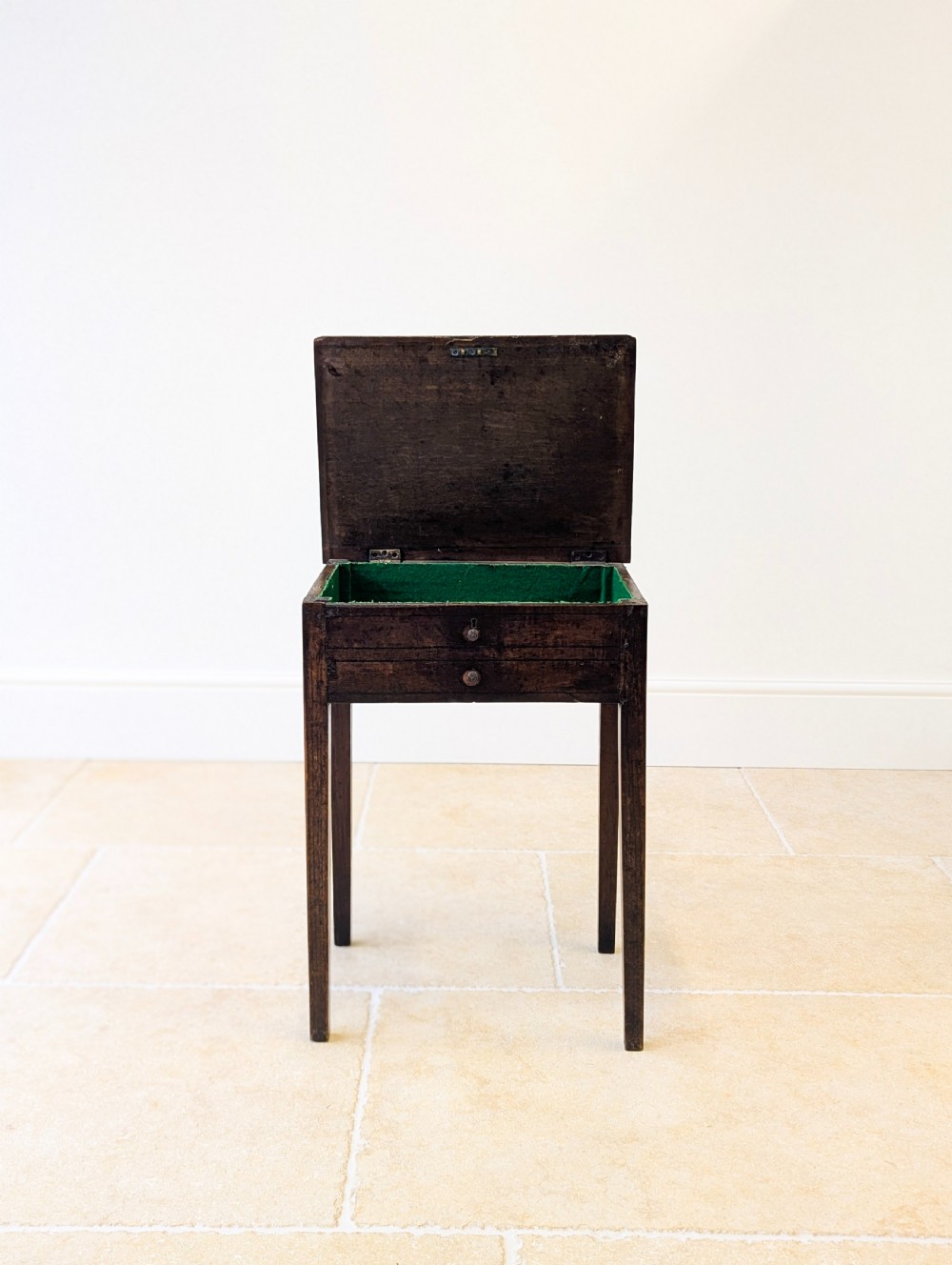 An antique Georgian dark oak work table featuring two drawers, straight square legs, and a rectangular top surface. View V