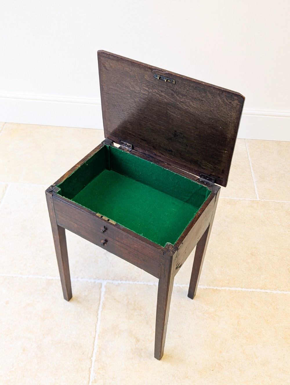 An antique Georgian dark oak work table featuring two drawers, straight square legs, and a rectangular top surface. View XII