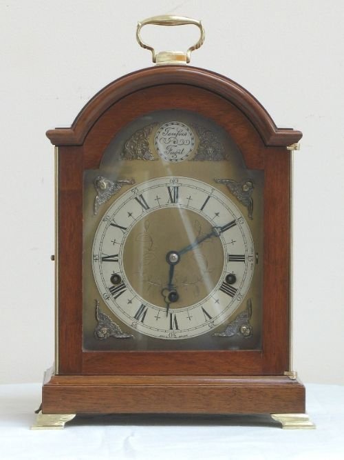 Beautiful English Flame Mahogany Bracket Mantle Clock by Elliott, Full Westminster and Whittington Chimes.
