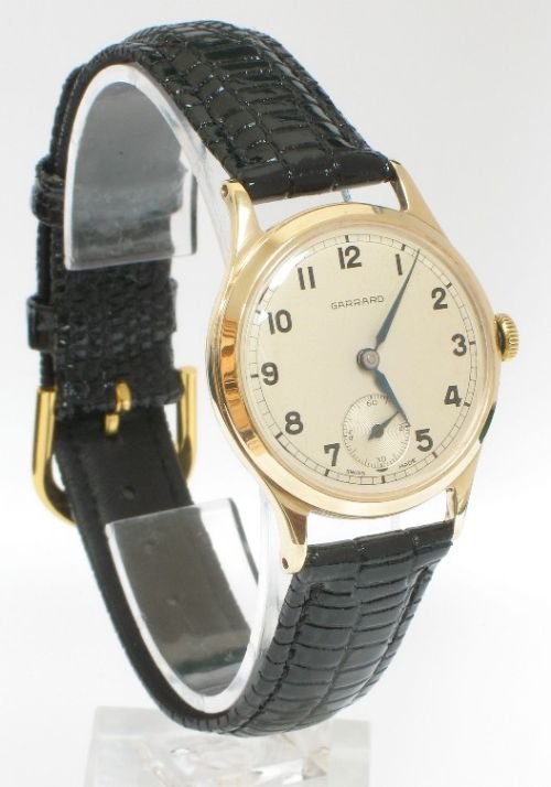 fig 1. IMMACULATE SOLID 9ct GOLD GARRARD MENS WATCH c1960