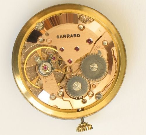 fig 3. STUNNING SOLID 9ct GOLD GARRARD MENS WATCH