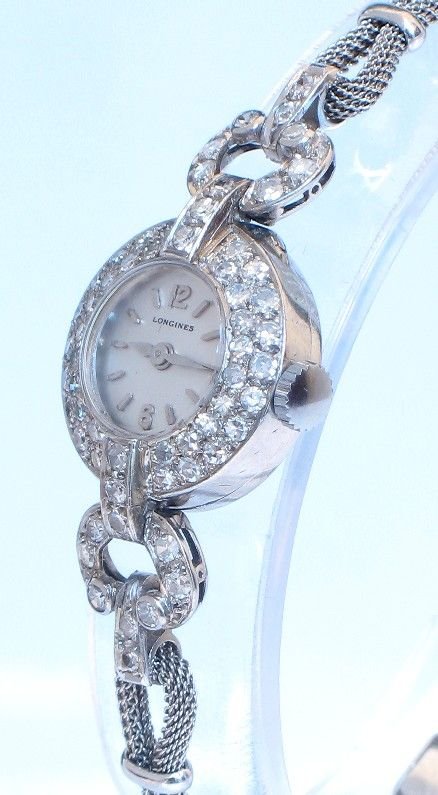 fig 3. EXQUISITE PLATINUM AND DIAMOND LADIES COCKTAIL WATCH BY LONGINES C1950
