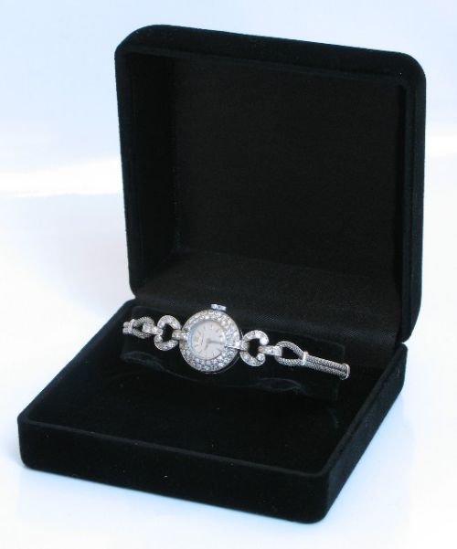 fig 4. EXQUISITE PLATINUM AND DIAMOND LADIES COCKTAIL WATCH BY LONGINES C1950