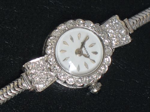 fig 4. DEVINE LONGINES ART DECO PLATINUM AND DIAMOND LADIES COCKTAIL WATCH C1957