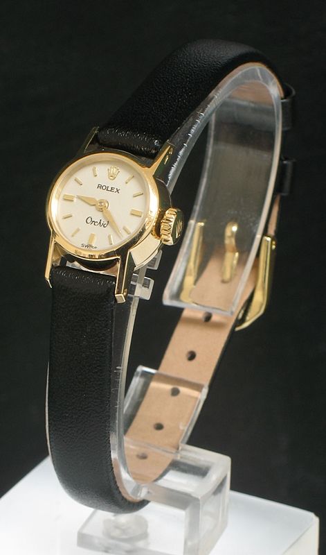 fig 1. STUNNING SOLID 18CT GOLD ROLEX ORCHID LADIES COCKTAIL WATCH