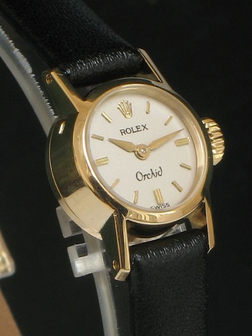 fig 3. STUNNING SOLID 18CT GOLD ROLEX ORCHID LADIES COCKTAIL WATCH