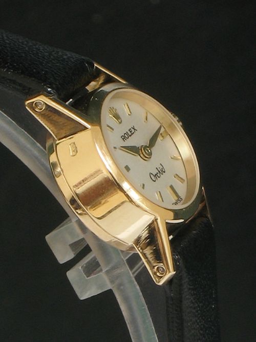 fig 5. STUNNING SOLID 18CT GOLD ROLEX ORCHID LADIES COCKTAIL WATCH