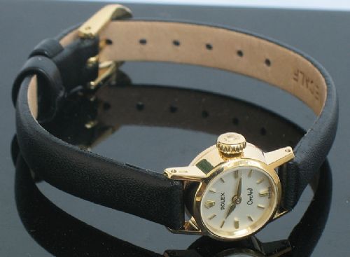 fig 7. STUNNING SOLID 18CT GOLD ROLEX ORCHID LADIES COCKTAIL WATCH