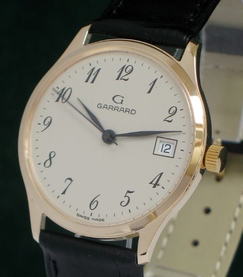 fig 1. STUNNING SOLID 9CT GOLD GARRARD MENS WATCH WITH BOX