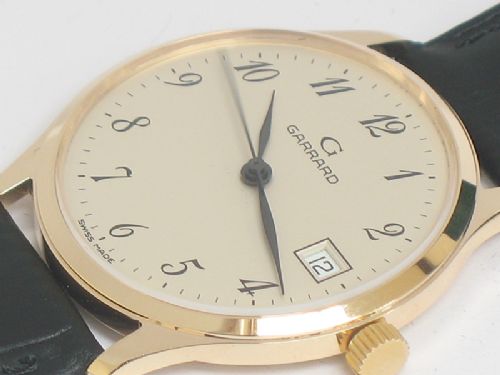 fig 2. STUNNING SOLID 9CT GOLD GARRARD MENS WATCH WITH BOX
