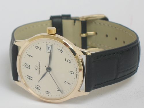 fig 3. STUNNING SOLID 9CT GOLD GARRARD MENS WATCH WITH BOX
