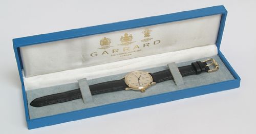 fig 6. STUNNING SOLID 9CT GOLD GARRARD MENS WATCH WITH BOX