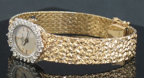 fig 5. STUNNING BAUME AND MERCIER SOLID 14CT GOLD AND DIAMONDS LADIES COCKTAIL WATCH