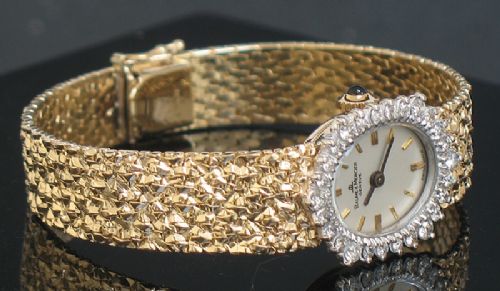 fig 7. STUNNING BAUME AND MERCIER SOLID 14CT GOLD AND DIAMONDS LADIES COCKTAIL WATCH
