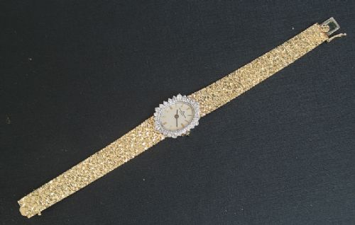 fig 8. STUNNING BAUME AND MERCIER SOLID 14CT GOLD AND DIAMONDS LADIES COCKTAIL WATCH