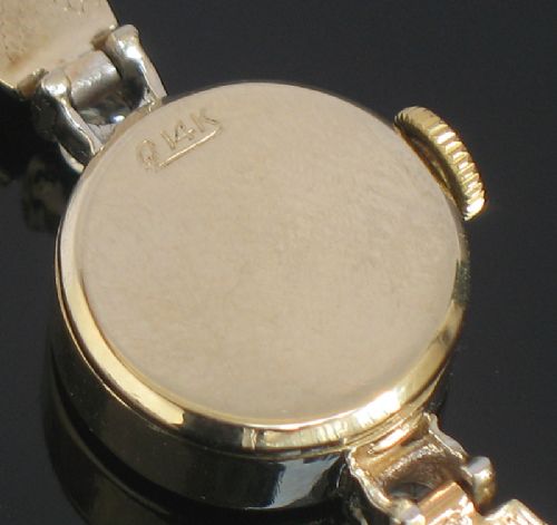 fig 6. STUNNING ROLEX SOLID 14CT GOLD AND DIAMOND LADIES COCKTAIL WATCH