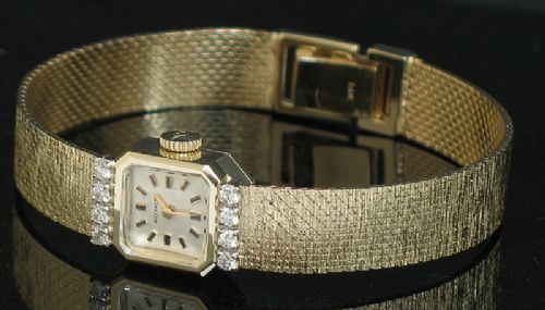 fig 6. BEAUTIFUL SOLID 14CT GOLD AND DIAMONDS MOVADO LADIES COCKTAIL WATCH