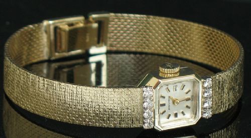 fig 8. BEAUTIFUL SOLID 14CT GOLD AND DIAMONDS MOVADO LADIES COCKTAIL WATCH