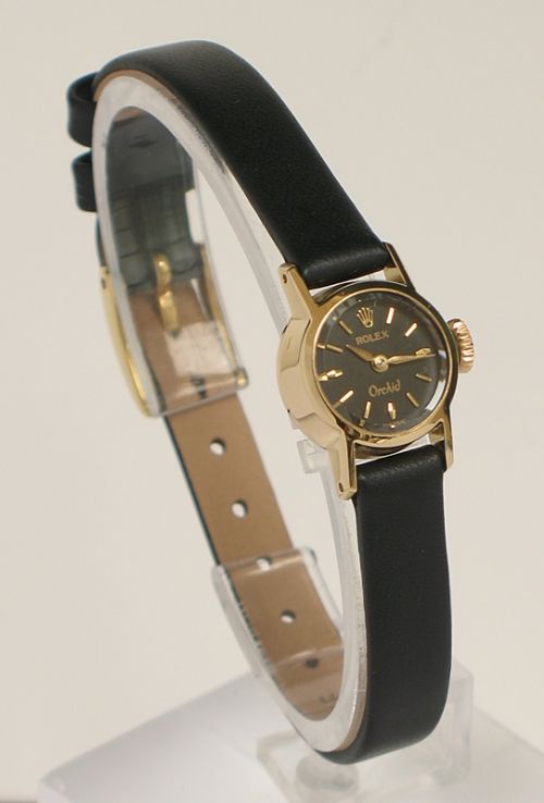 fig 1. EXQUISITE SOLID 18CT GOLD ROLEX ORCHID LADIES COCKTAIL WATCH