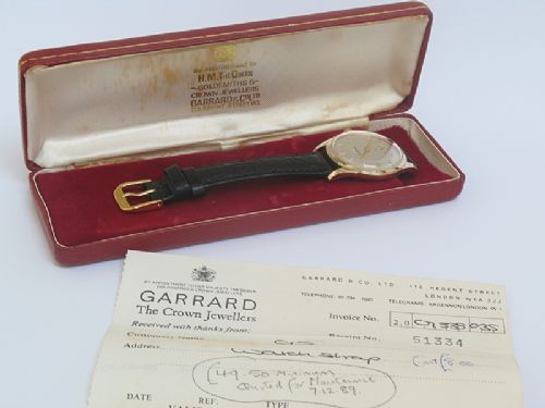 fig 7. OUTSTANDING SOLID 9CT GOLD MENS WATCH BY GARRARD THE CROWN JEWELERS