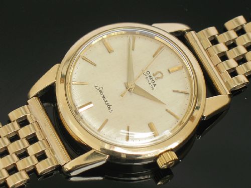 fig 7. SUPERB ORIGINAL SOLID 9CT GOLD OMEGA SEAMASTER AUTOMATIC MENS WATCH ON A SOLID 9CT GOLD BRACELET