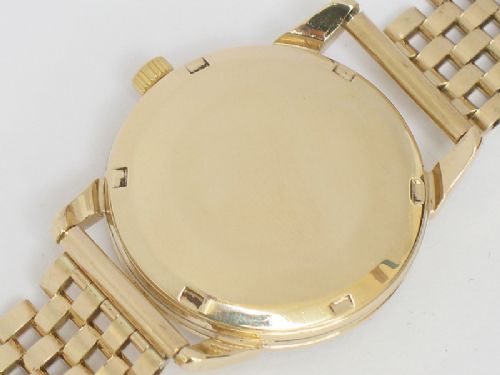 fig 9. SUPERB ORIGINAL SOLID 9CT GOLD OMEGA SEAMASTER AUTOMATIC MENS WATCH ON A SOLID 9CT GOLD BRACELET